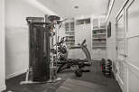 This home gym is the perfect space to achieve your fitness goals.