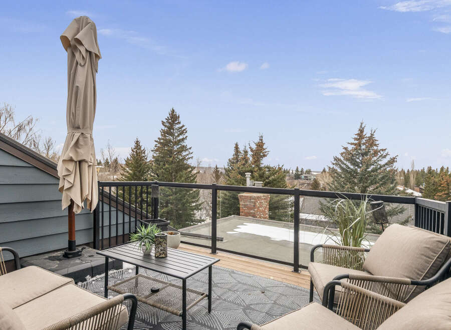 Enjoy breathtaking views from this stunning outdoor deck, perfect for relaxation and entertaining.