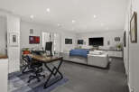 This modern living space is perfect for both work and relaxation.