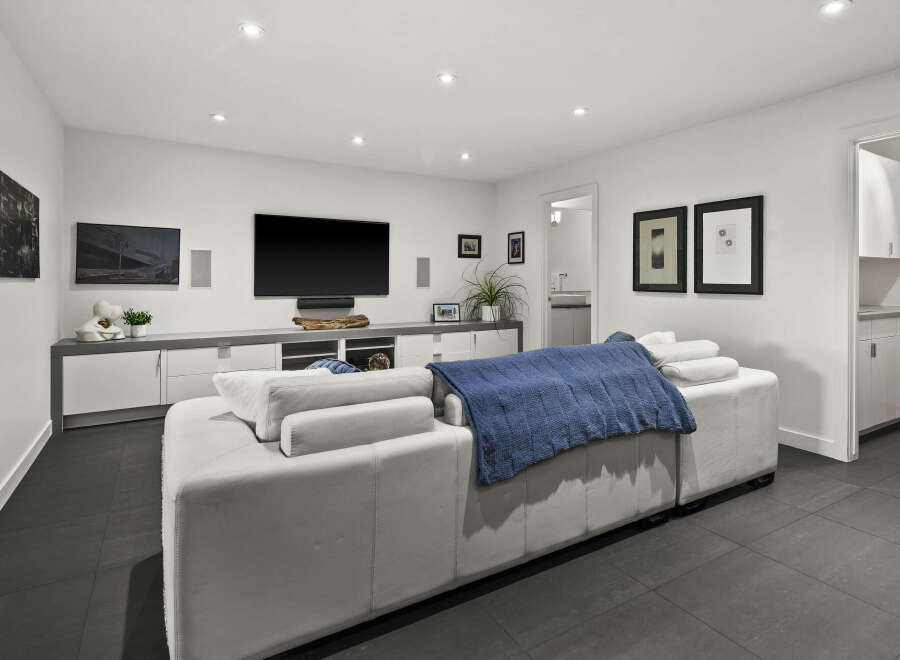 Step into modern luxury with this stunning living space.
