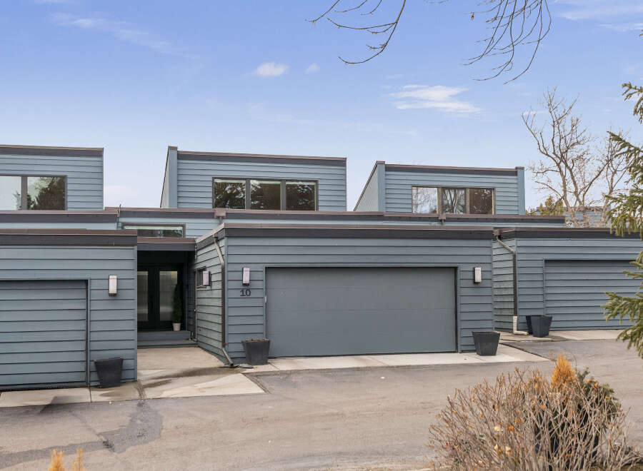 Discover modern living in this stunning townhome featuring a sleek, contemporary design.
