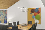 This stunning dining room showcases a modern aesthetic with its sleek design and high-end finishes.