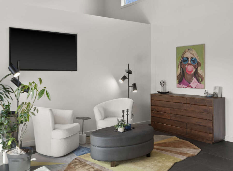 Step into modern luxury with this stunning living space.