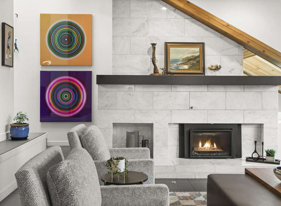 This stunning living room boasts a modern fireplace, perfect for cozy evenings.