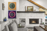 This stunning living room boasts a modern fireplace, perfect for cozy evenings.