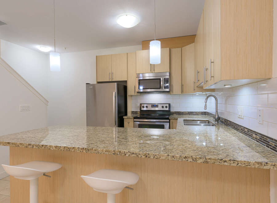This stunning kitchen boasts modern design and functionality.