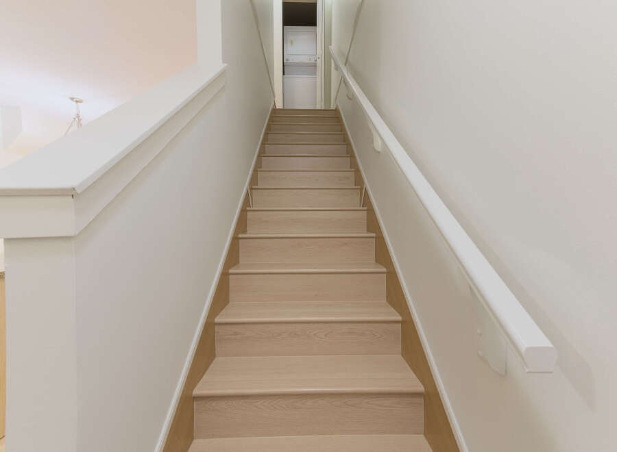 Ascend to your dreams in this stunning home! This property features a beautifully designed staircase, perfect for adding a touch of elegance to your living space.