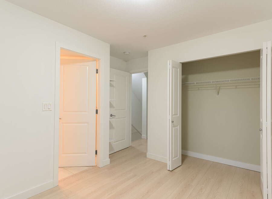 Step into this bright and airy space, featuring a well-lit interior with neutral tones.