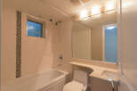This inviting bathroom features a clean and modern design, perfect for relaxation.