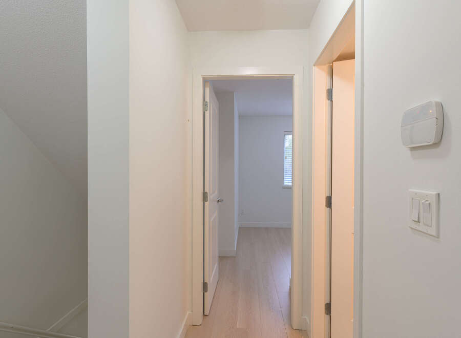 Step into this inviting hallway, showcasing a bright and airy atmosphere.