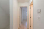 Step into this inviting hallway, showcasing a bright and airy atmosphere.