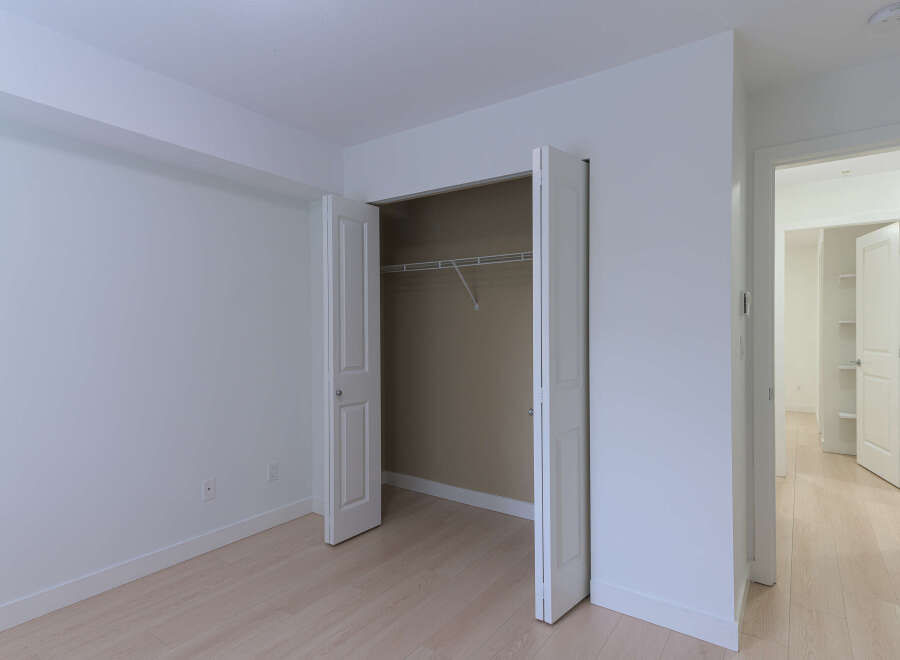 Step into this bright and airy space, featuring a spacious closet and a neutral color palette that invites personalization.