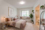 Step into a serene bedroom retreat, thoughtfully designed for comfort and style.
