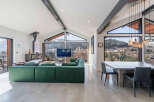 Experience luxury living in this stunning property, boasting a modern design and breathtaking mountain views.