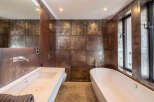 Step into luxury with this stunning bathroom featuring a modern design and high-end finishes.