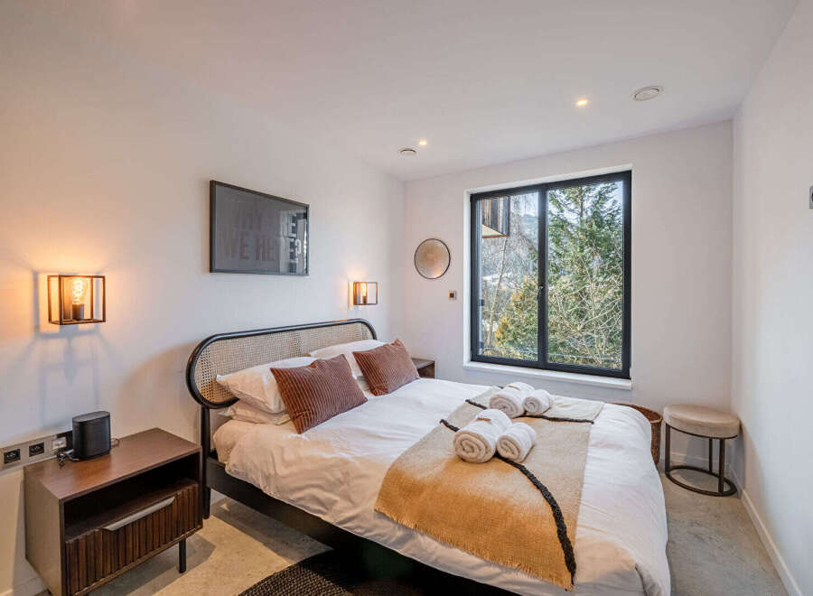 Experience tranquility in this beautifully designed bedroom.