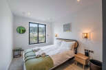 Experience the tranquility of this beautifully designed bedroom.