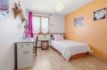 This charming bedroom features a cozy single bed, perfect for a guest room or a child's space.