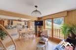 Experience the charm of this stunning property, featuring a bright and airy living space with wooden accents.