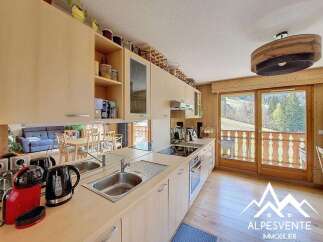 This stunning kitchen boasts a modern design with sleek cabinetry and stainless steel appliances.