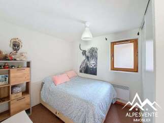 Discover this charming bedroom, perfect for a cozy retreat.