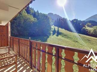 Enjoy breathtaking mountain views from this charming balcony.