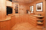 This stunning property boasts a beautifully crafted wooden interior, creating a warm and inviting atmosphere.