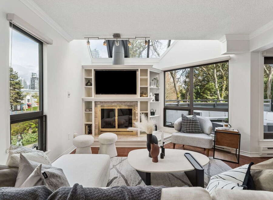 Experience luxury living in this stunning property! This home boasts a modern design with a cozy fireplace, perfect for relaxing evenings.