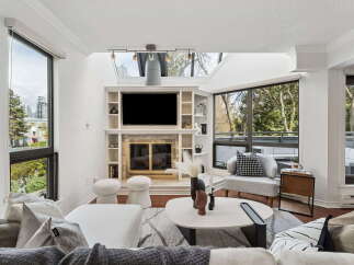 Experience luxury living in this stunning property! This home boasts a modern design with a cozy fireplace, perfect for relaxing evenings.