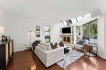 Step into luxury with this stunning property featuring a bright and airy living room.