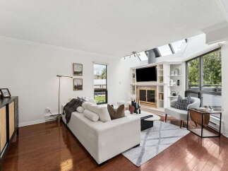 Step into luxury with this stunning property featuring a bright and airy living room.