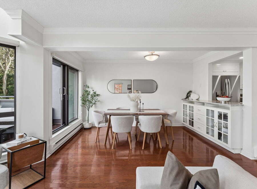 Step into this stunning dining room, featuring a modern design with a touch of elegance.