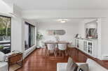 Step into this stunning dining room, featuring a modern design with a touch of elegance.