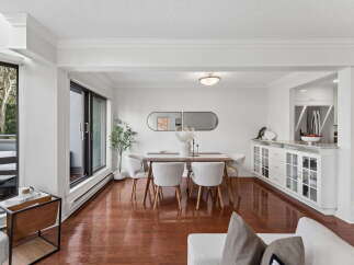 Step into this stunning dining room, featuring a modern design with a touch of elegance.