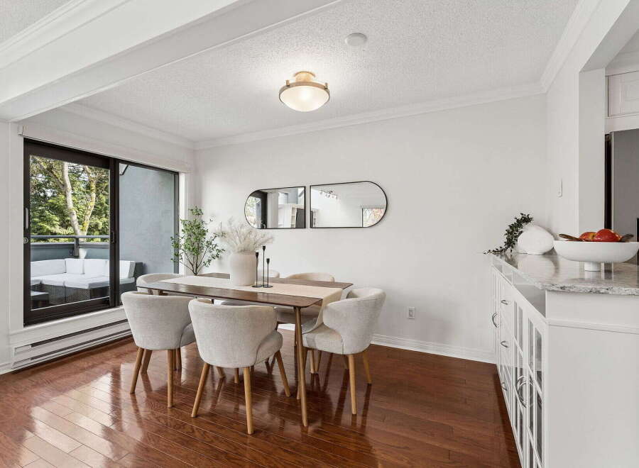 This stunning dining area boasts a modern design with sleek lines and a bright, airy atmosphere.