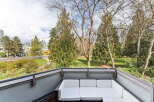 Enjoy breathtaking views from this stunning property! This modern space features a comfortable outdoor seating area, perfect for relaxing and entertaining.