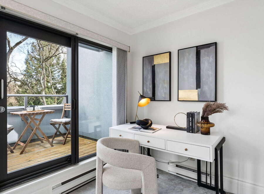 Step into a bright and airy home office with stunning views.