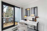 Step into a bright and airy home office with stunning views.