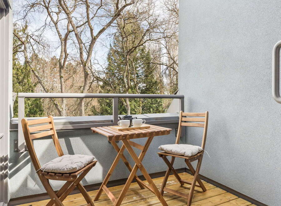 Enjoy the tranquility of this charming balcony, perfect for morning coffee or evening relaxation.