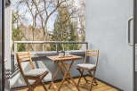 Enjoy the tranquility of this charming balcony, perfect for morning coffee or evening relaxation.