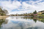 Enjoy stunning waterfront views from this beautiful property, offering a serene escape with easy access to urban amenities.