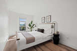 This stunning bedroom offers a serene retreat with its bright, airy design and modern aesthetic.