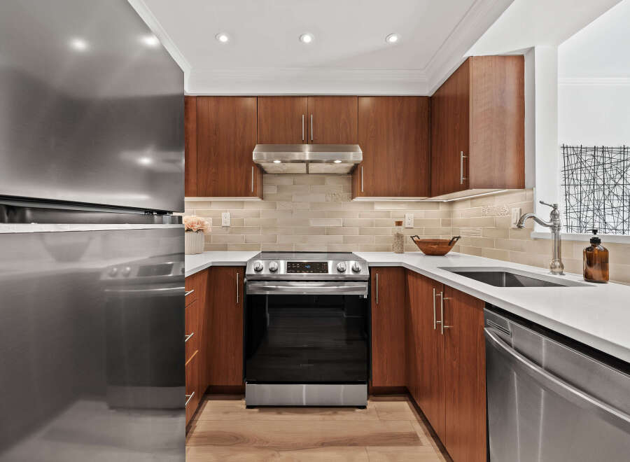 This stunning kitchen boasts modern design and functionality.