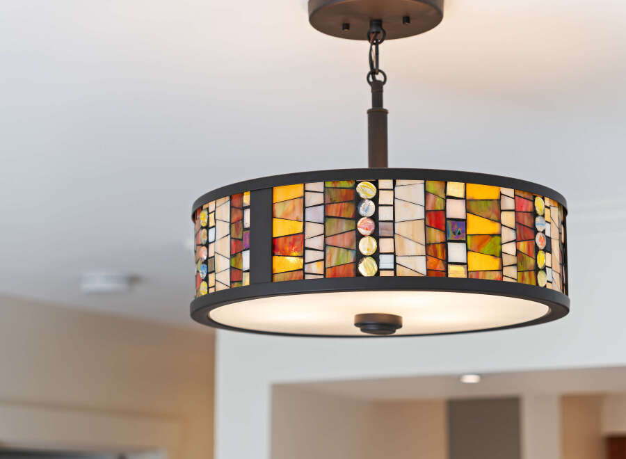 This stunning property features a unique and stylish light fixture, adding a touch of elegance to the space.