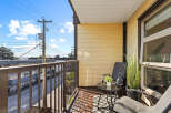 Enjoy the fresh air and stunning views from this charming balcony.