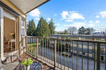 Enjoy stunning views from this beautiful balcony! This property features a modern design with a cozy outdoor space, perfect for relaxing or entertaining.
