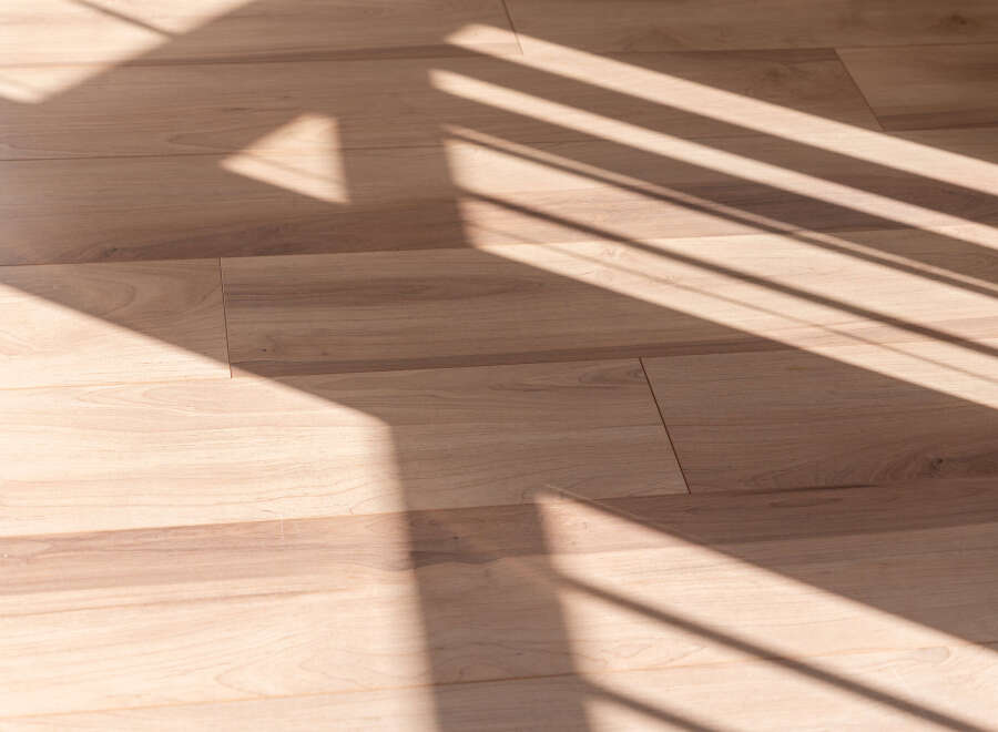 This image showcases a beautifully crafted hardwood floor, perfect for any home.
