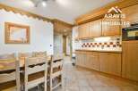Discover the charm of this inviting property, featuring a cozy dining area and a well-equipped kitchen.