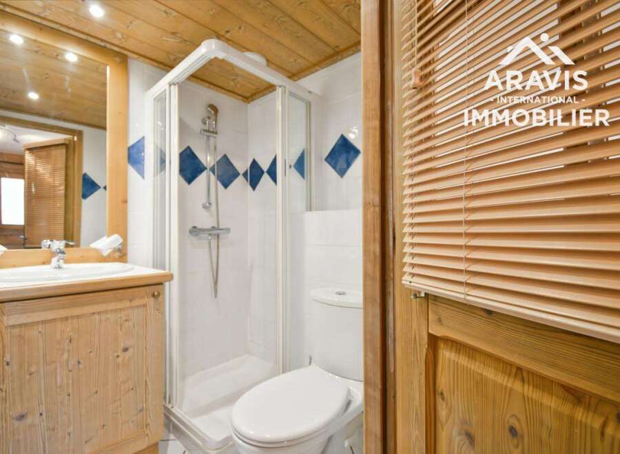 Discover this charming property featuring a well-appointed bathroom with a shower and toilet.