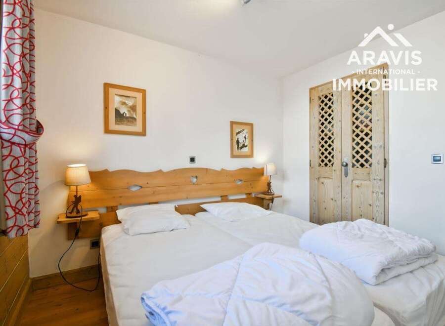 Discover the charm of this cozy bedroom, perfect for a relaxing getaway.